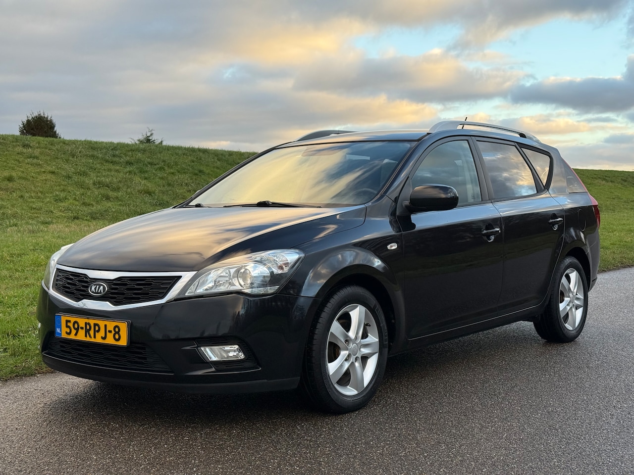 Kia Cee'd Sporty Wagon - 1.4 CVVT Seven Business - AutoWereld.nl
