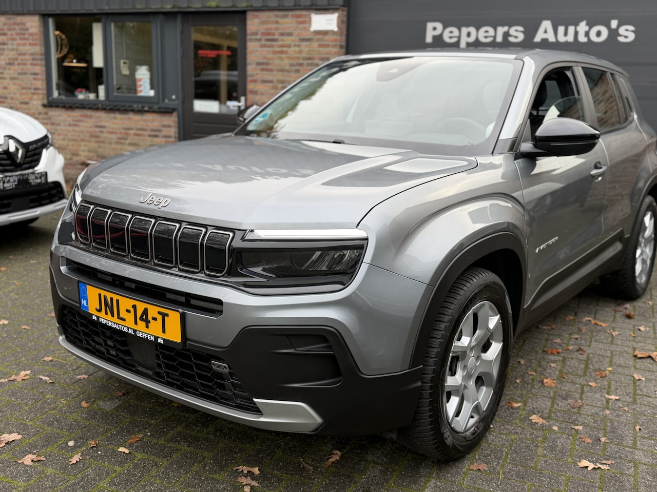 Jeep Avenger - 1.2 Altitude cruise contr Navi sportvelgen camera half leder . - AutoWereld.nl