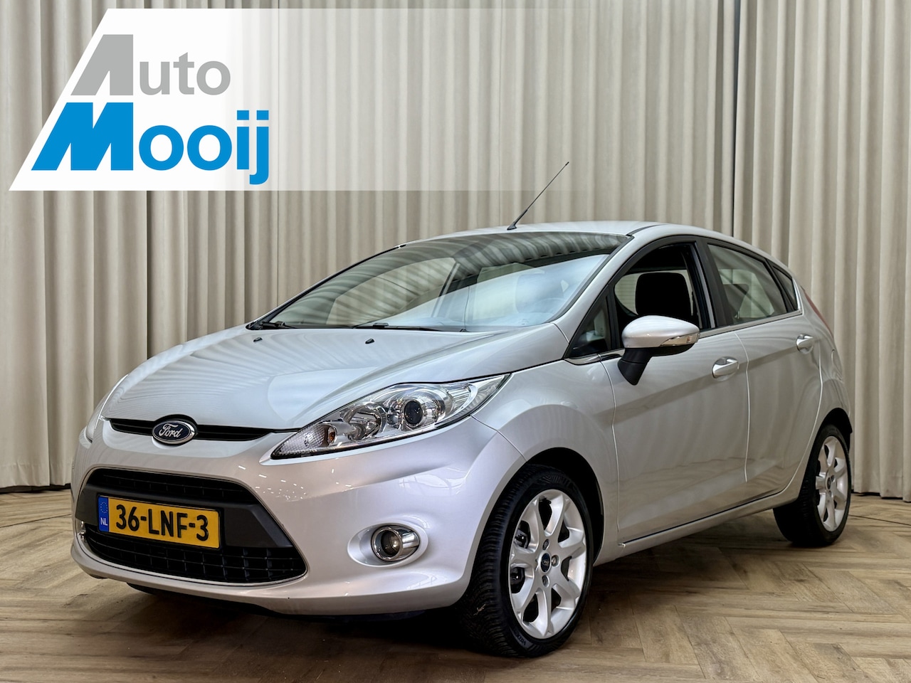 Ford Fiesta - 1.25 Titanium Org.NL! / ECC Clima / Bluetooth / Cruise Control / 15'' LMV - AutoWereld.nl