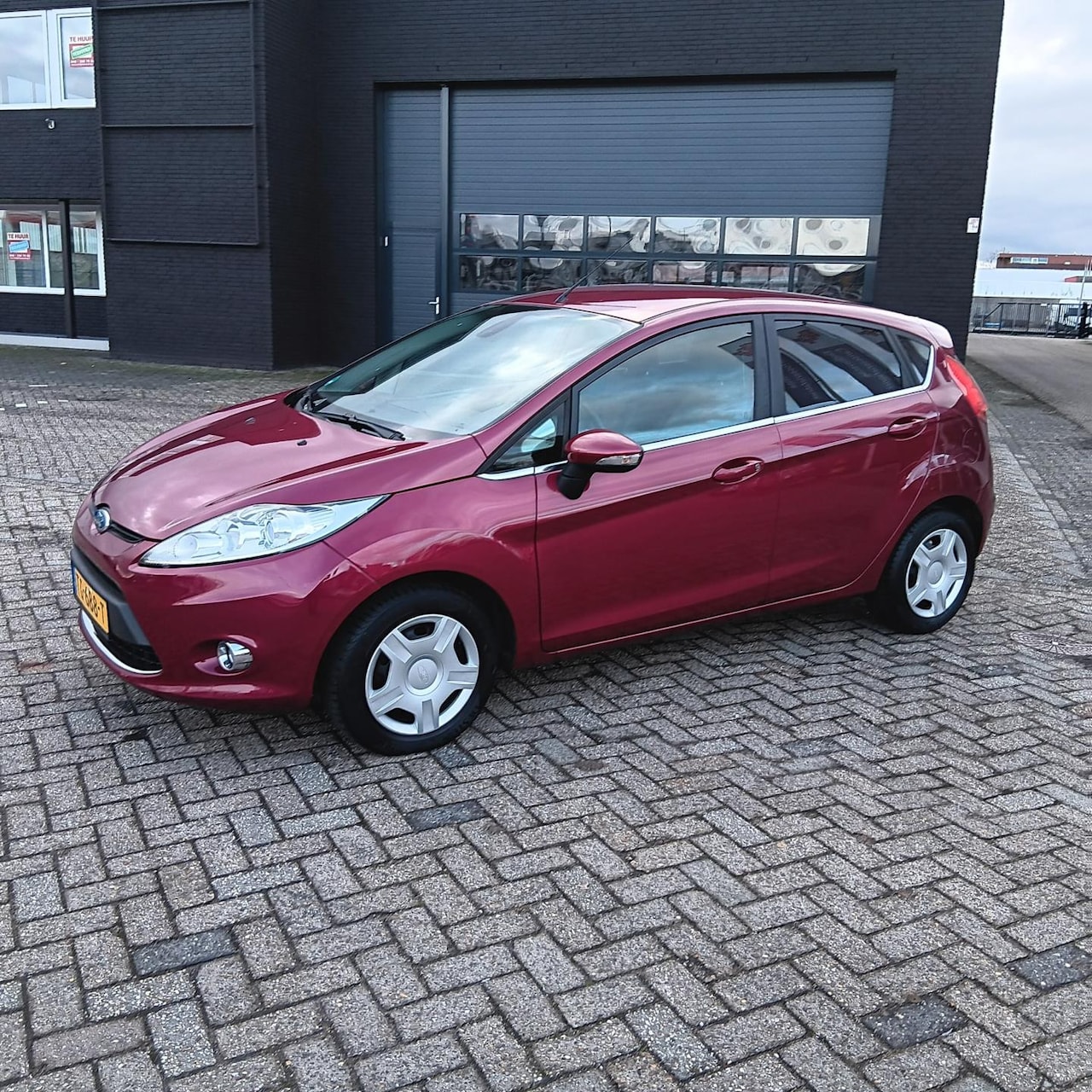 Ford Fiesta - 1.25 Ghia 1.25 Ghia - AutoWereld.nl