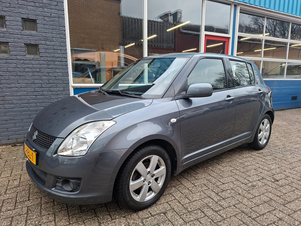 Suzuki Swift - 1.3 Shogun Trekhaak Airco RIJKLAAR - AutoWereld.nl