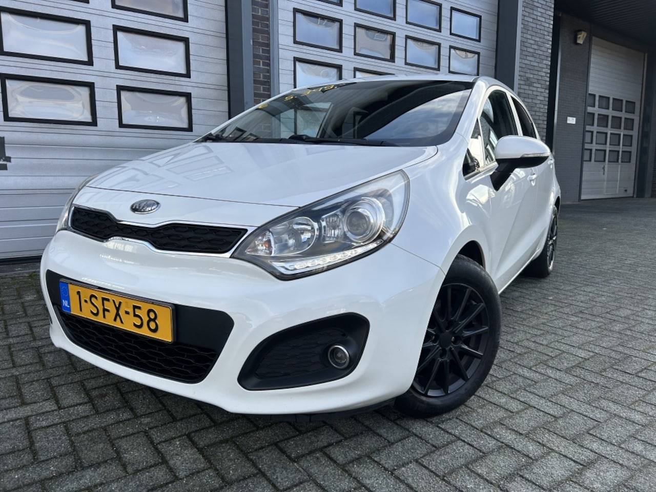 Kia Rio - 1.2 CVVT Plus Pack 5DRS Airco Rijdt Super! - AutoWereld.nl