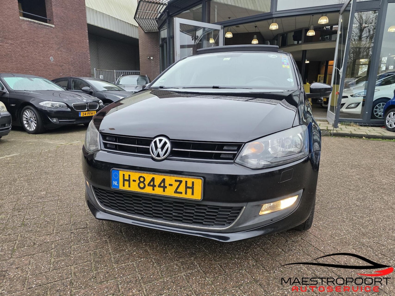 Volkswagen Polo - 1.4 Bifuel AF-Fabriek LPG! - 2012 Zwart - AutoWereld.nl
