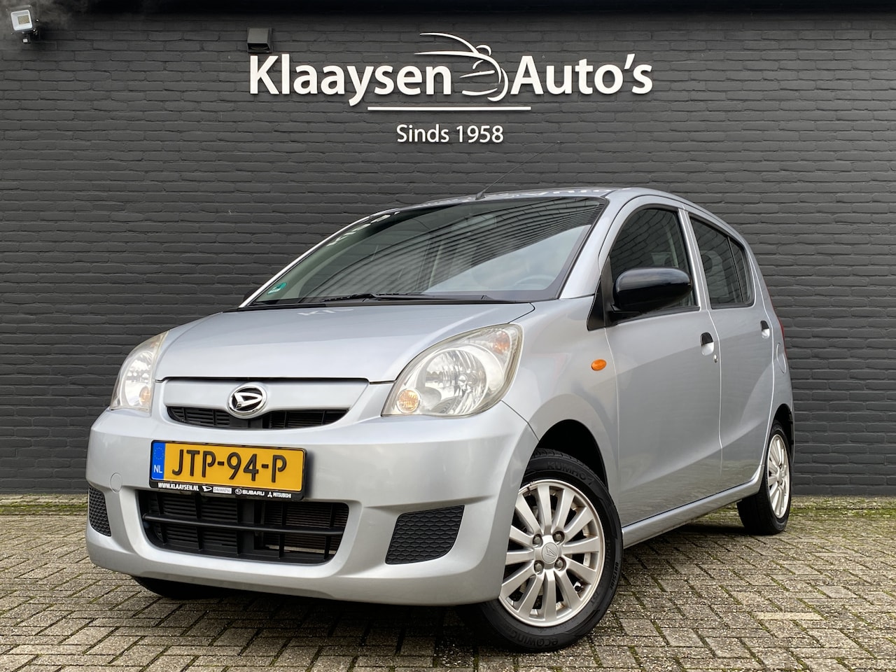 Daihatsu Cuore - 1.0 Comfort | Airco | radio cd speler | lichtmetalen velgen | schuif-/kanteldak | centr. d - AutoWereld.nl