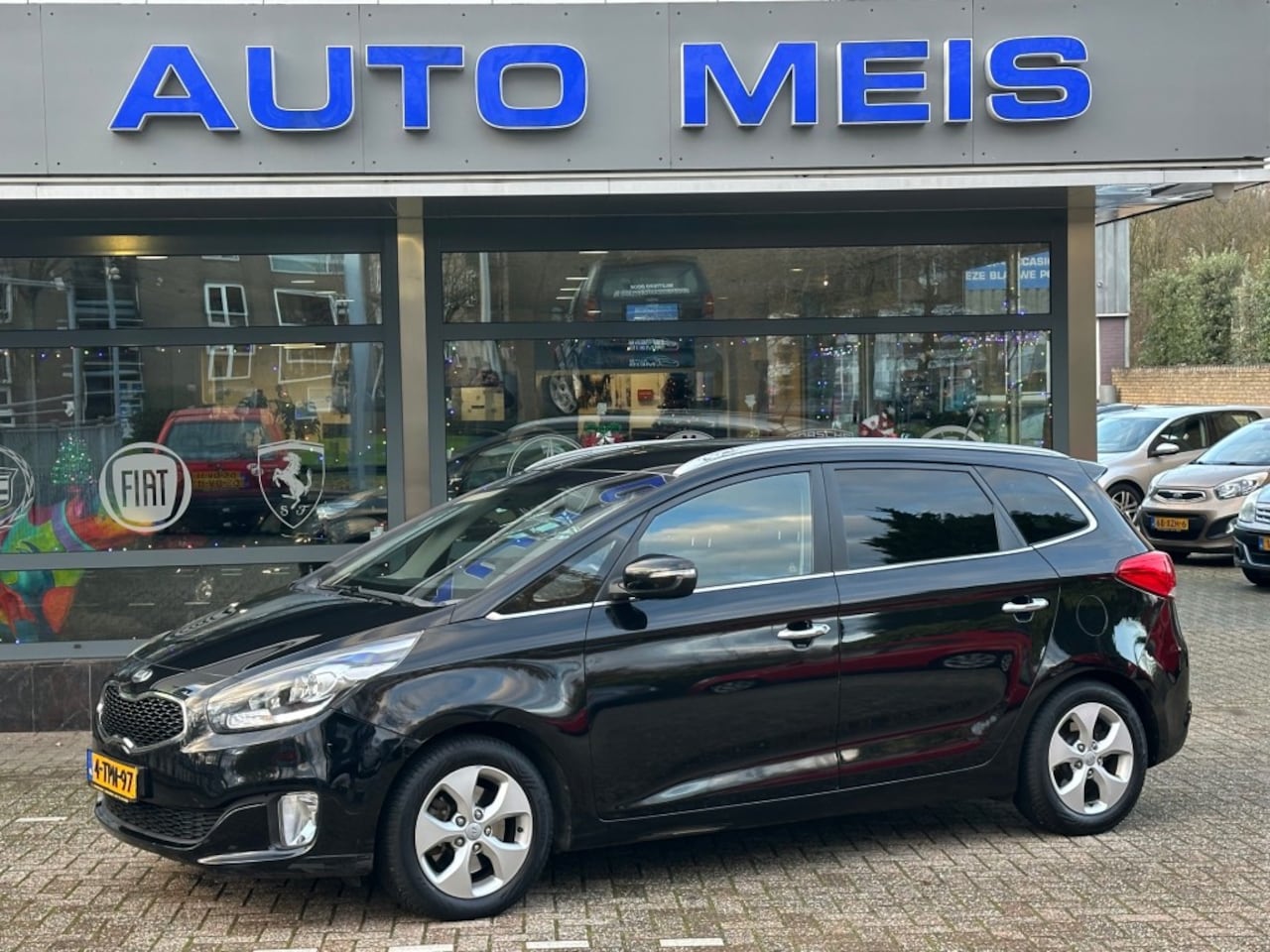 Kia Carens - 2.0 GDI Business Pack Automaat 7P Navi Clima Cruise - AutoWereld.nl