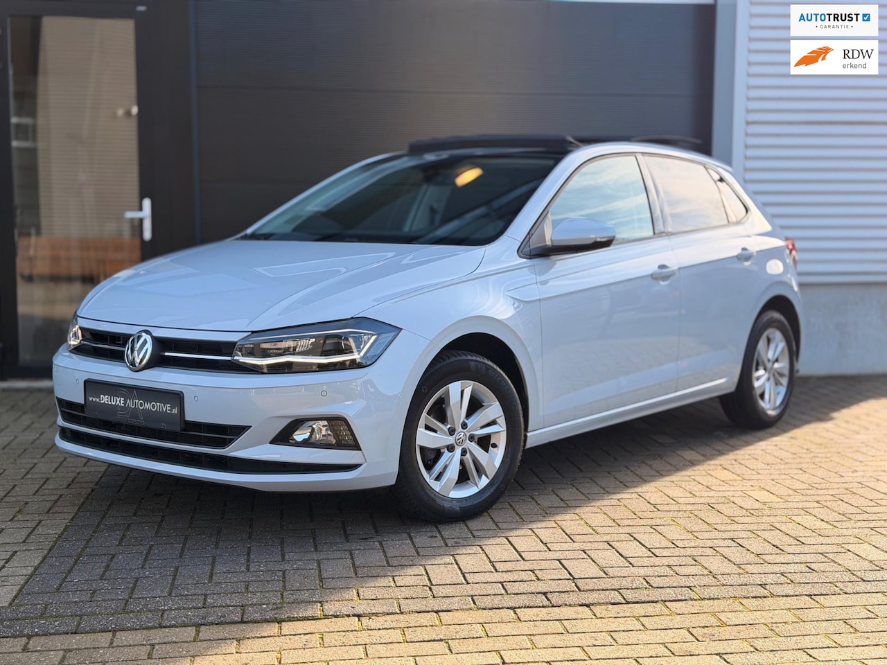 Volkswagen Polo - 1.0 TSI Comfortline Business Panoramadak - AutoWereld.nl