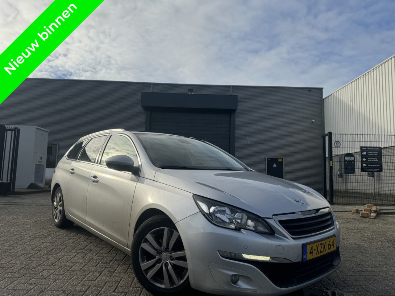 Peugeot 308 SW - 1.6 BlueHDI Panorama|Navigatie 2014 - AutoWereld.nl