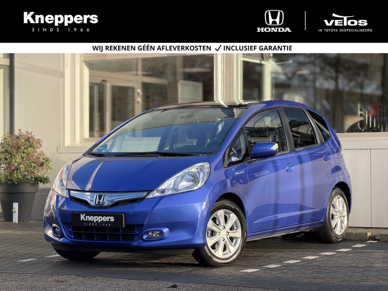 Honda Jazz - 1.4 Hybrid Exclusive | GEEN AFLEVERKOSTEN | Trekhaak, Panormadak, Lederen bekleding - AutoWereld.nl