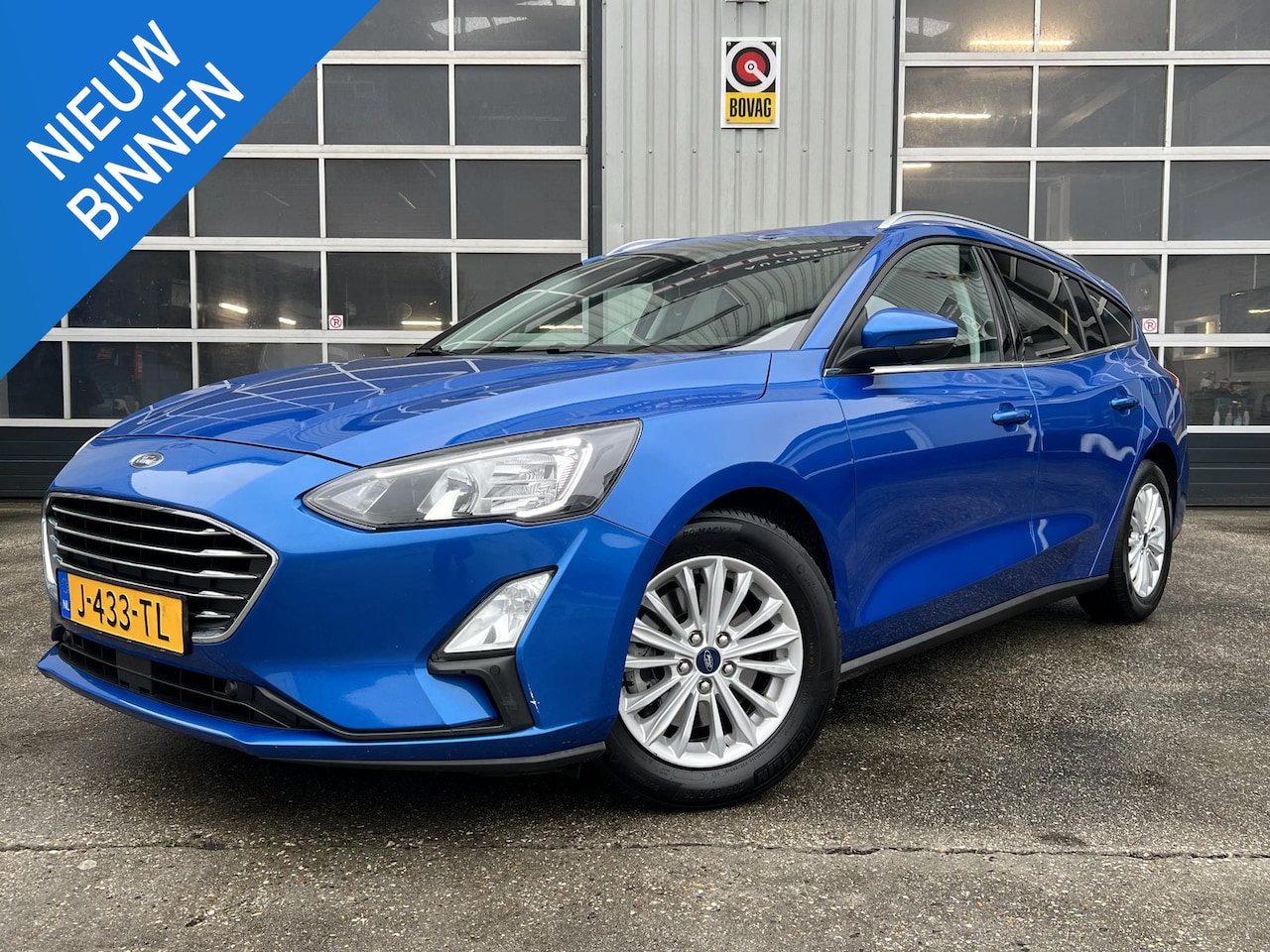 Ford Focus Wagon - 1.0 EcoBoost Hybrid Titanium X Business Stoelverw. trekhaak navi camera - AutoWereld.nl