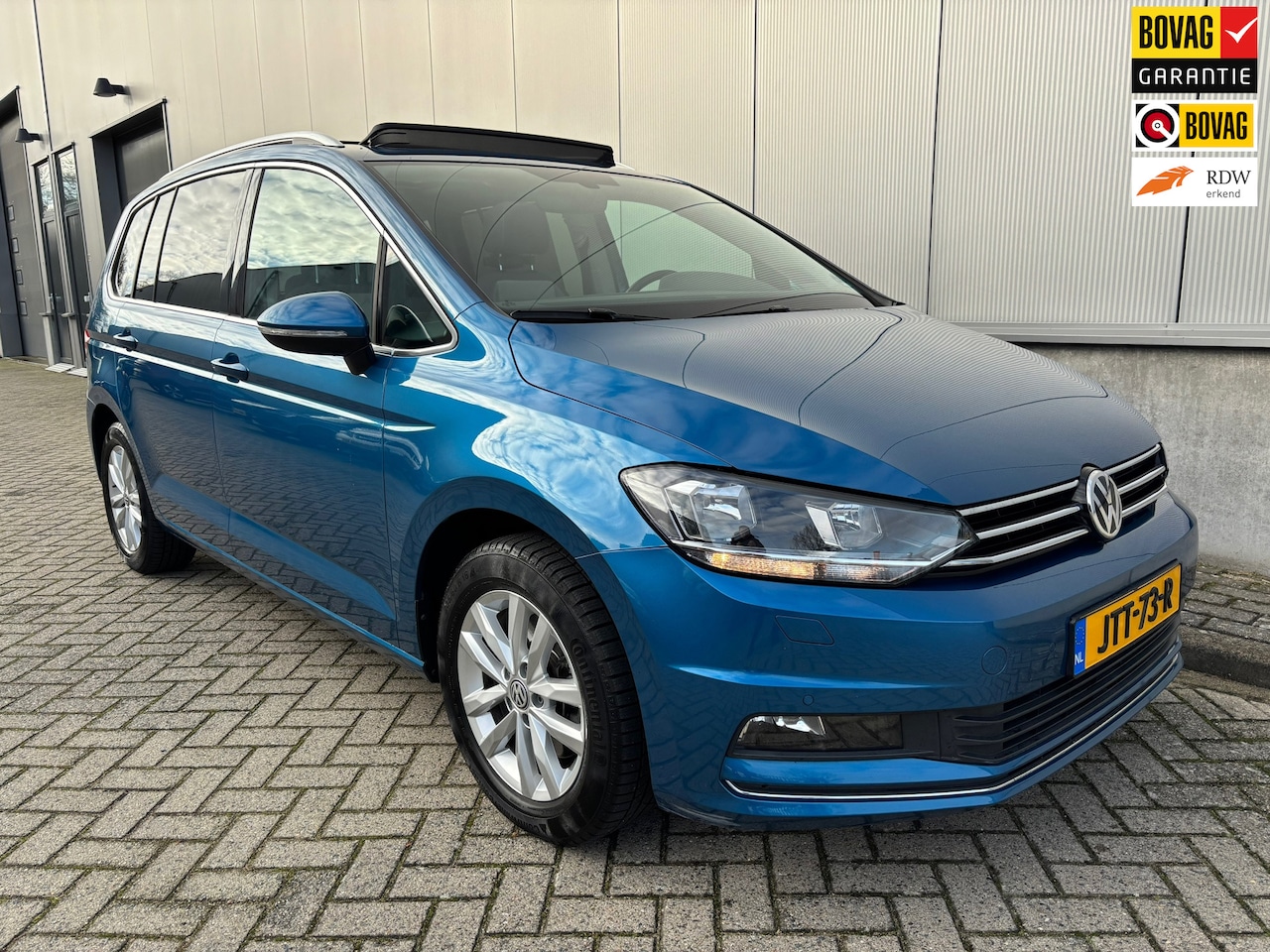 Volkswagen Touran - 1.4 TSI Highline 7p / Panorama dak / Camera / Carplay - AutoWereld.nl