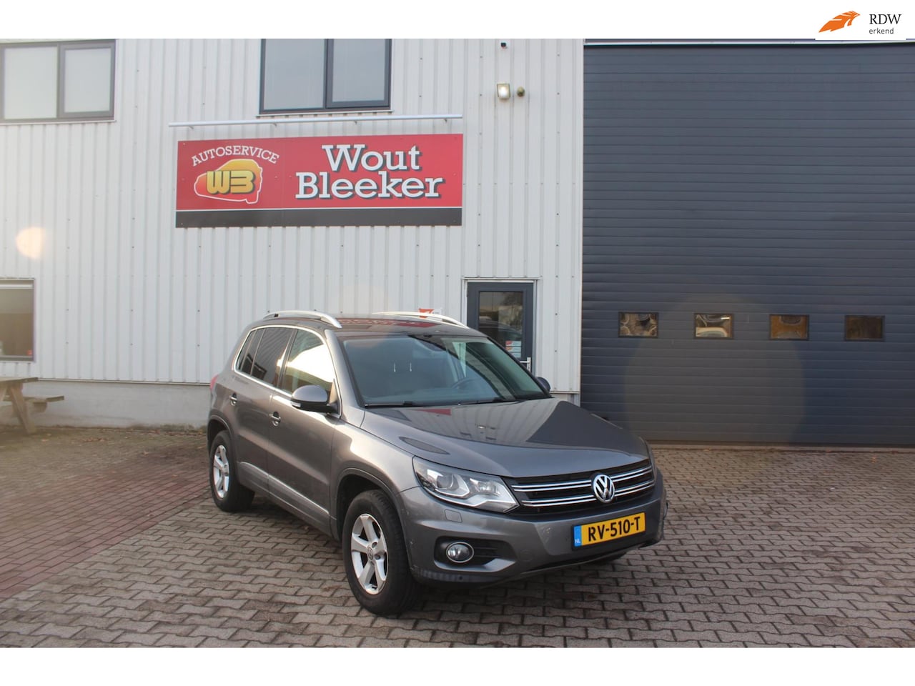 Volkswagen Tiguan - 2.0 TSI Sport&Style 4Motion automaat stoelverw - AutoWereld.nl