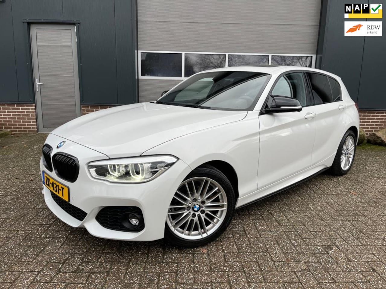 BMW 1-serie - 118i M Sport Edition-Carplay-Stoelverwarming-Schuifkantel dak! - AutoWereld.nl