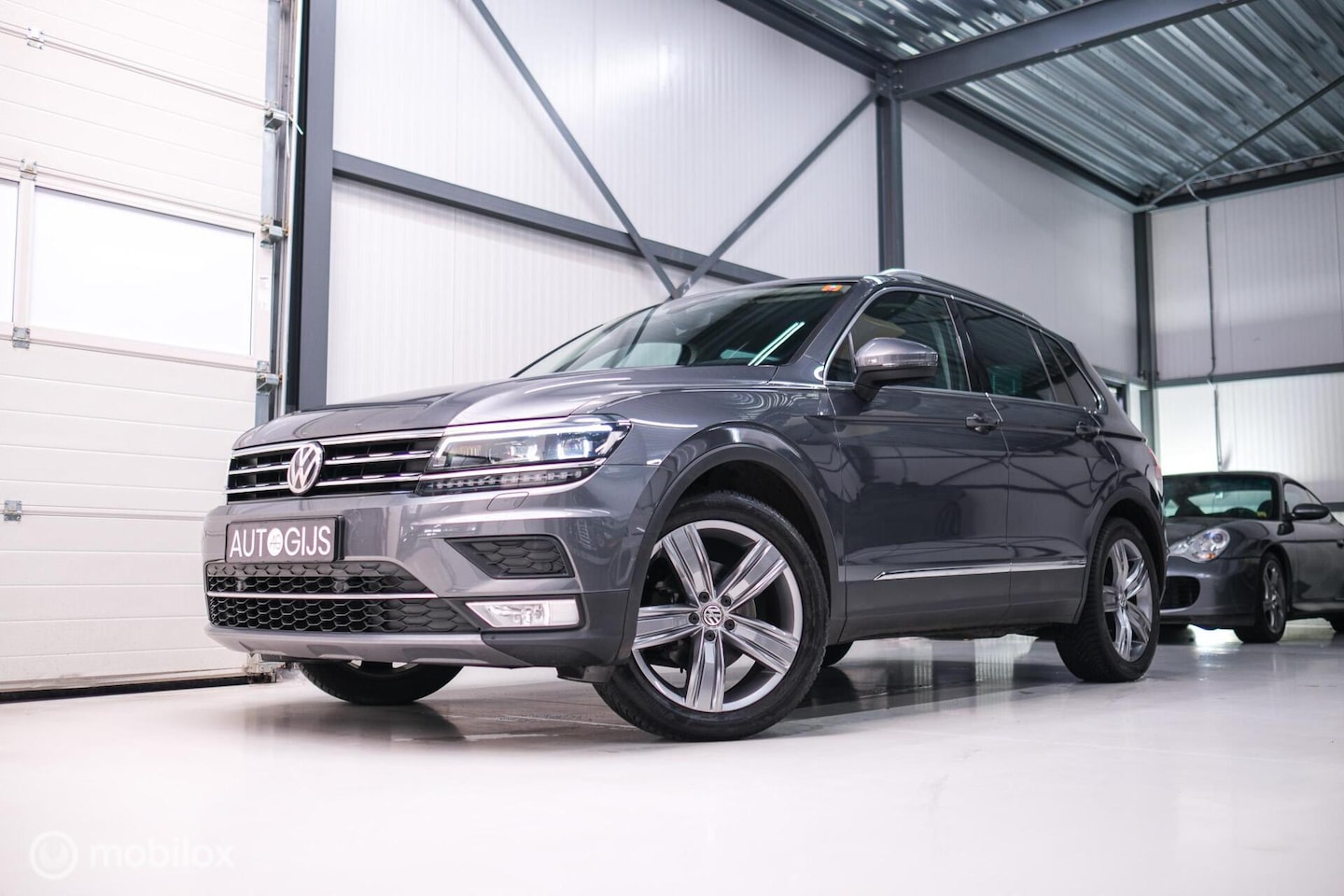 Volkswagen Tiguan - 1.4 TSI ACT Highline DSG | LED | Adaptive | Trekhaak | Virtual Cockpit | Stoelverwarming | - AutoWereld.nl