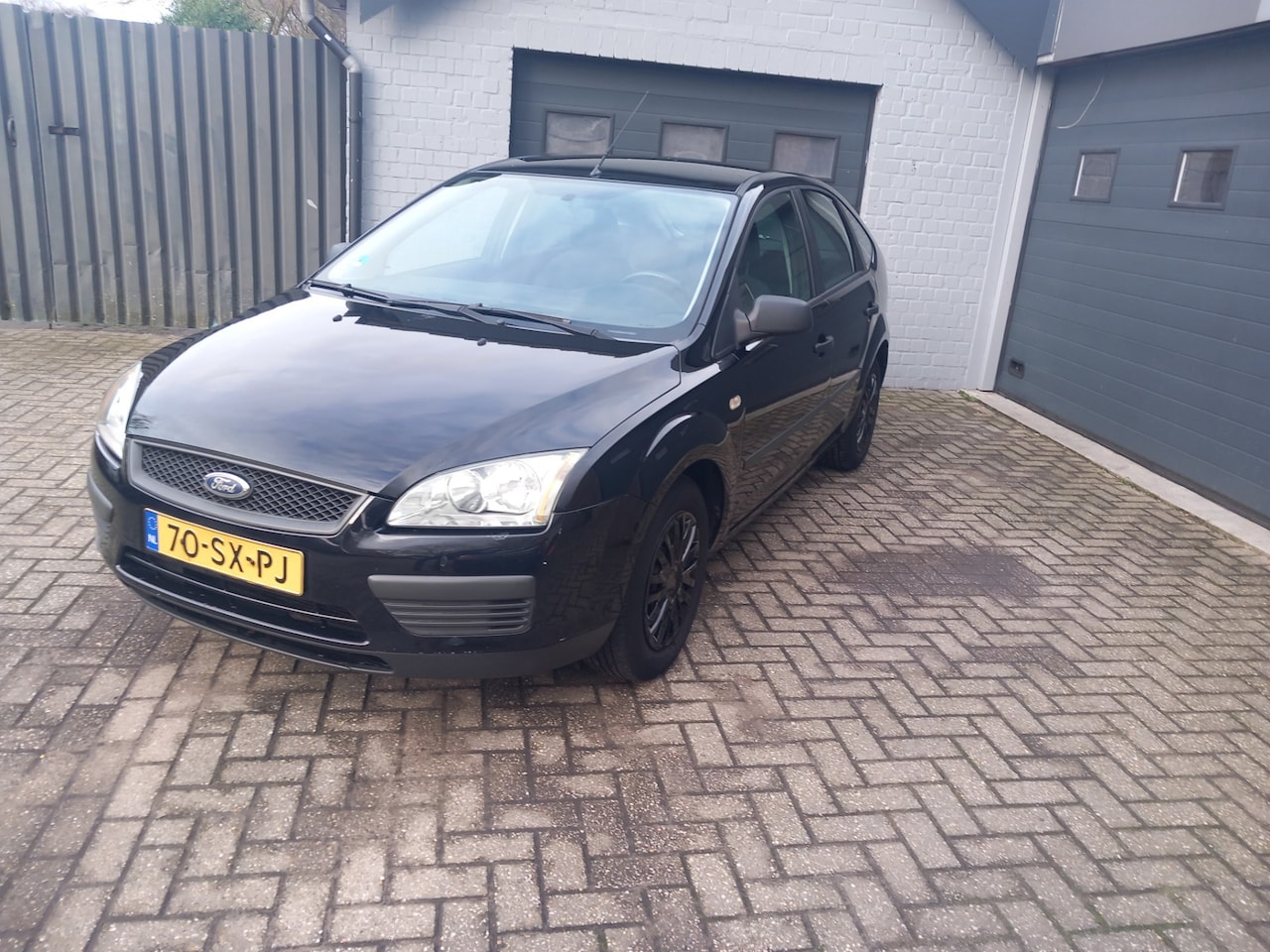 Ford Focus - 1.6-16V Champion 1.6-16V Champion,Airco,Cruise control,Trekhaak - AutoWereld.nl