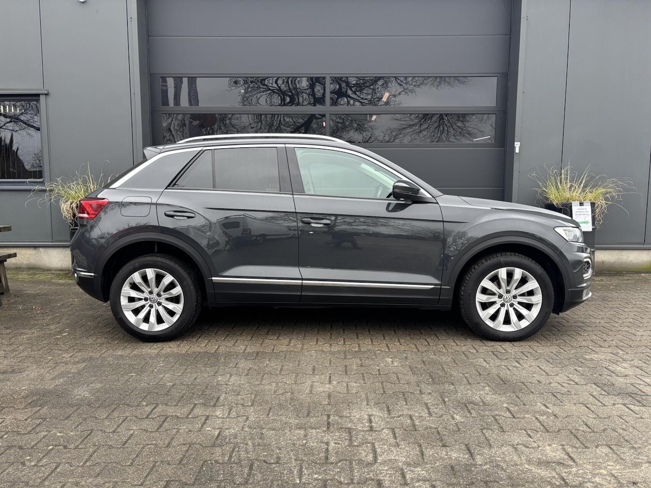 Volkswagen T-Roc - 1.5 TSI Sport Airco/ Adaptieve Cruise Control/ Elektrisch Glazen Panorama-Dak/ Volledig Di