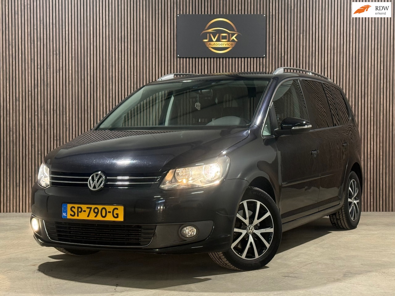 Volkswagen Touran - 1.6 TDI Highline BlueMotion 7p. 1.6 TDI Highline BlueMotion 7p. DSG PDC - AutoWereld.nl