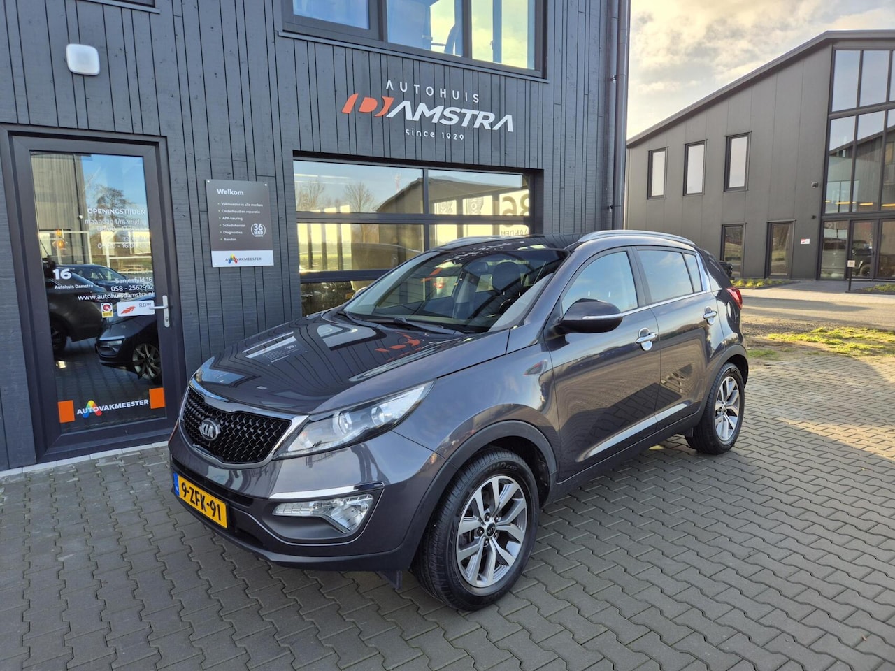 Kia Sportage - 1.6 GDI BusinessPlusLine|Airco|Navi|Trekhaak|Camera| - AutoWereld.nl