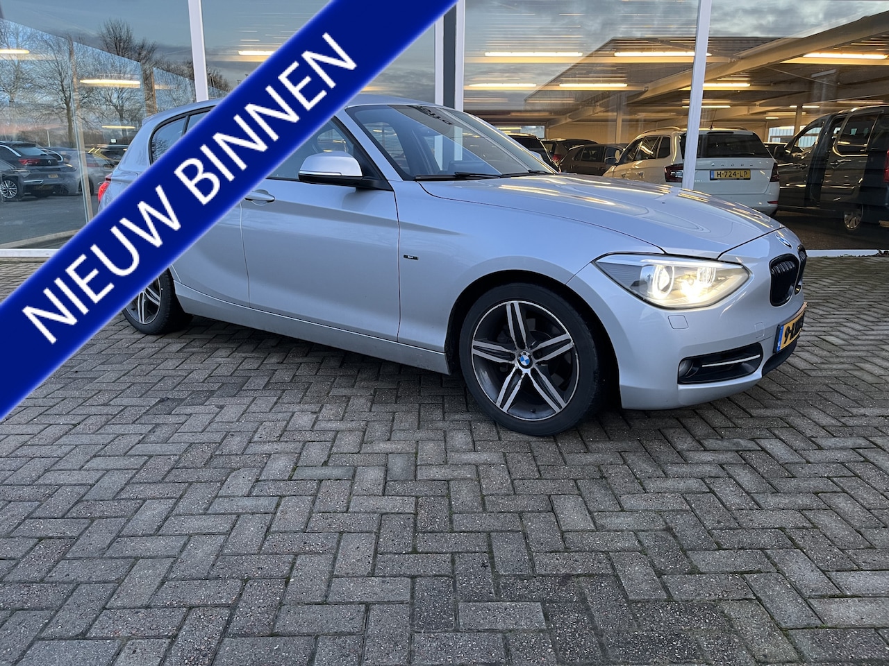 BMW 1-serie - 118i Limited Edition Carplay / Clima / Nav / Led / Cruise - AutoWereld.nl