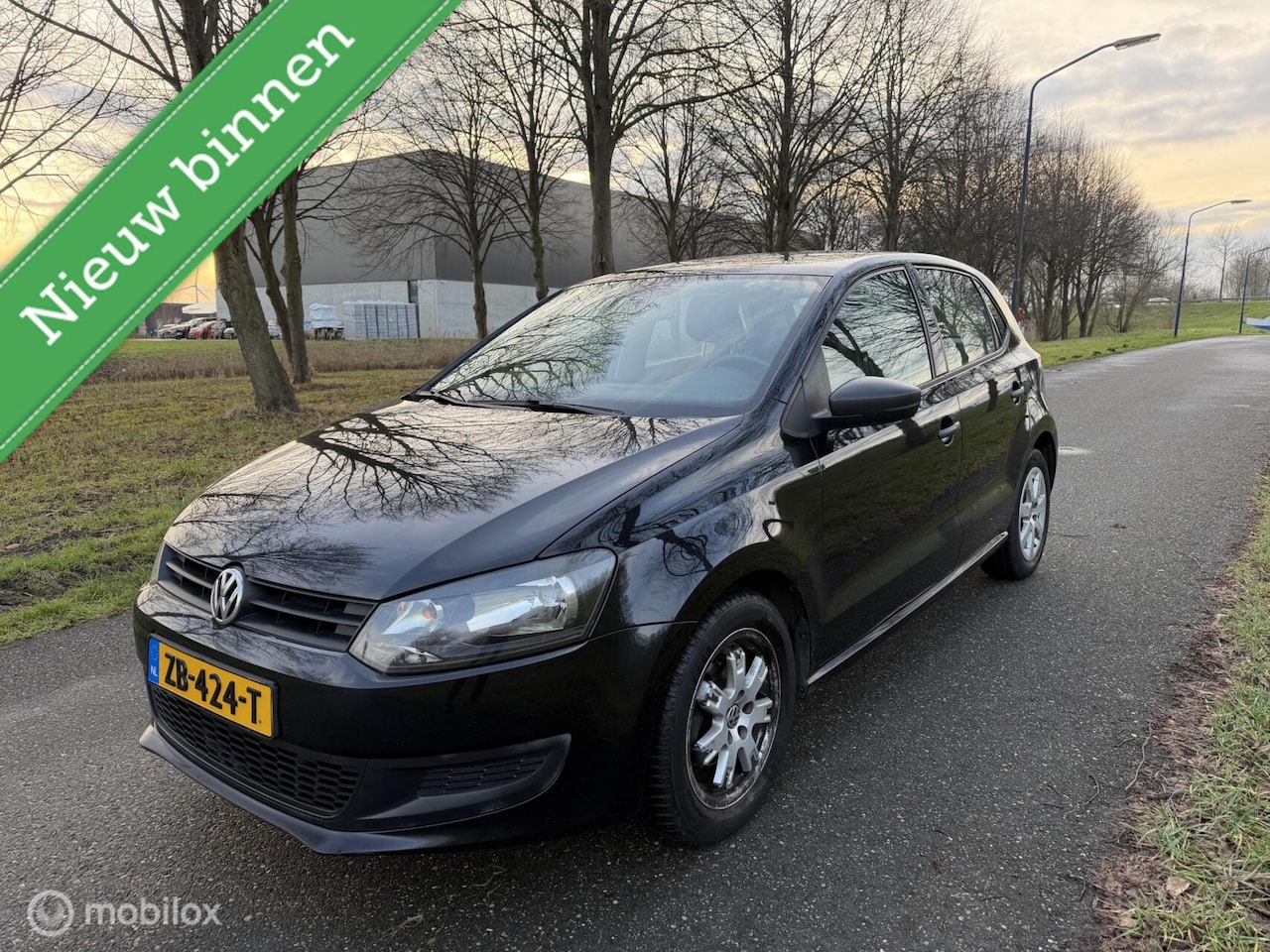 Volkswagen Polo - 1.2-12V Trendline*NEW APK 02/27*SCHERM*AIRCO - AutoWereld.nl