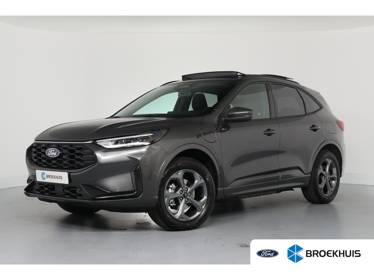 Ford Kuga - Plug-In Hybrid ST-Line | Trekhaak Elektrisch Wegklapbaar | Elektrisch Panoramadak | Winter - AutoWereld.nl