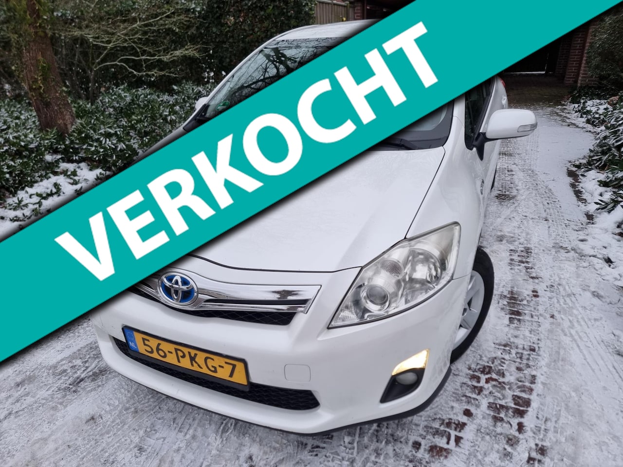 Toyota Auris - 1.8 Full Hybrid Aspiration Navigator - AutoWereld.nl
