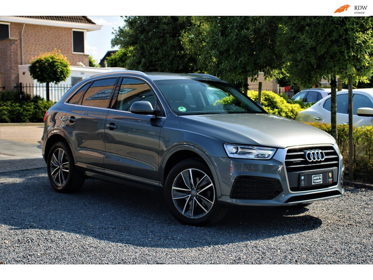 Audi Q3 - 2.0 TFSI Quattro Sport line | S-tronic | Trekhaak | LEER | - AutoWereld.nl