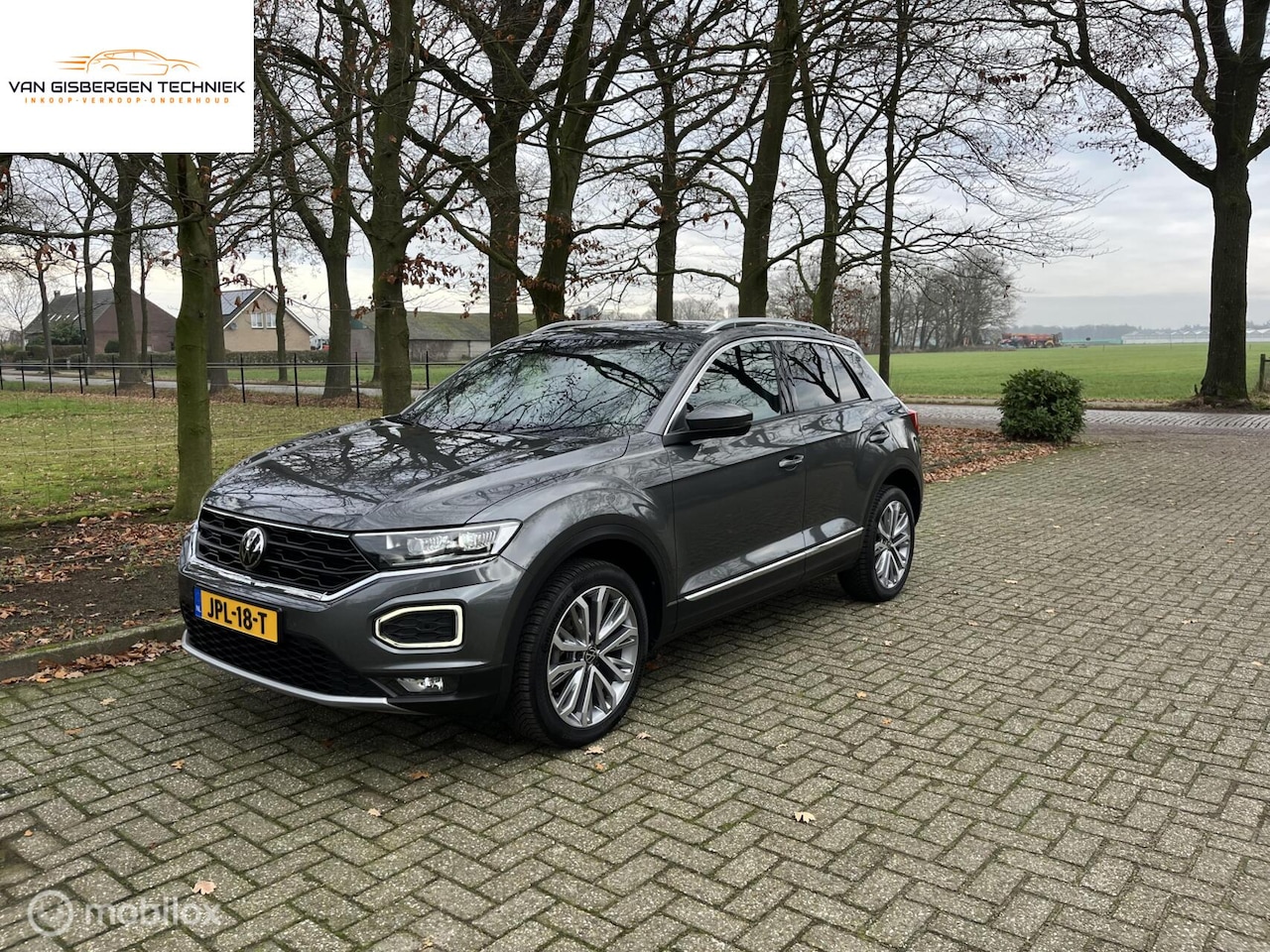 Volkswagen T-Roc - 1.5 TSI Sport carplay, pano, camera all in - AutoWereld.nl