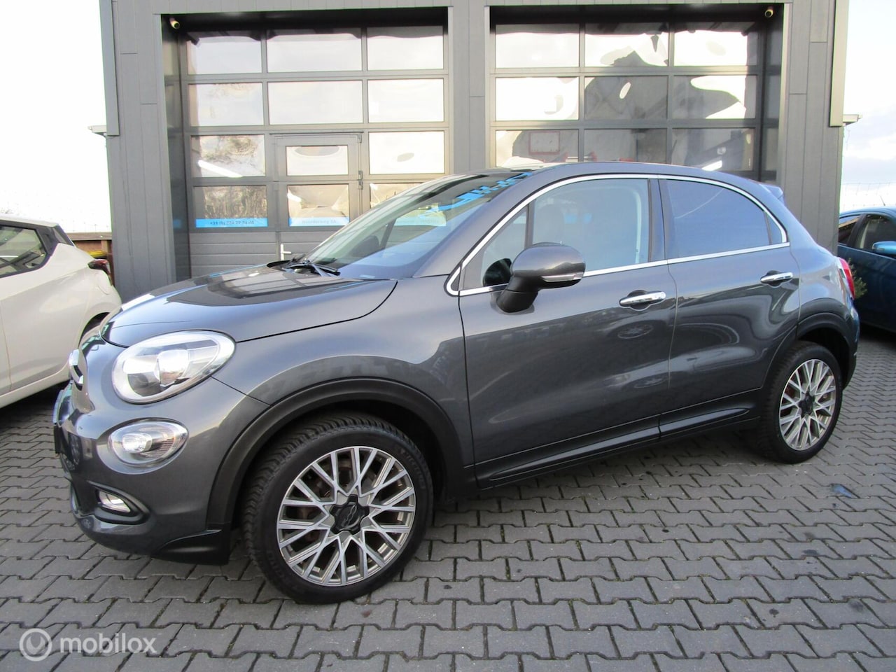 Fiat 500 X - 1.4 Turbo MultiAir Lounge 101dkm Xenon Trekhaak Org NL - AutoWereld.nl