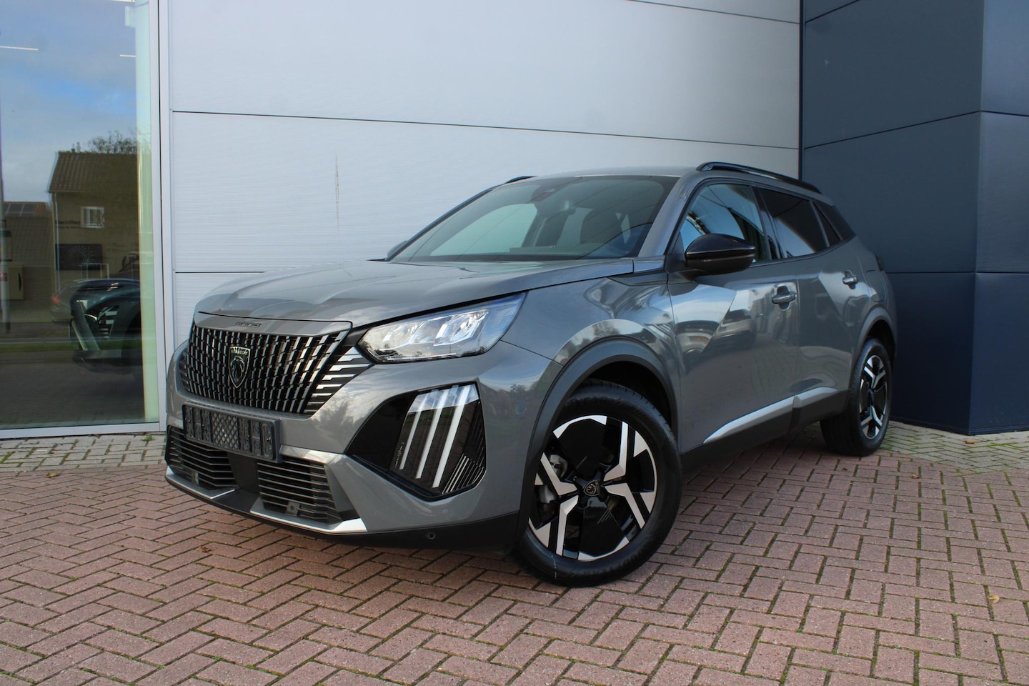 Peugeot 2008 - 1.2 PureTech 100pk Allure Airco Carplay PDC V+A 10.964km Nieuwstaat - AutoWereld.nl