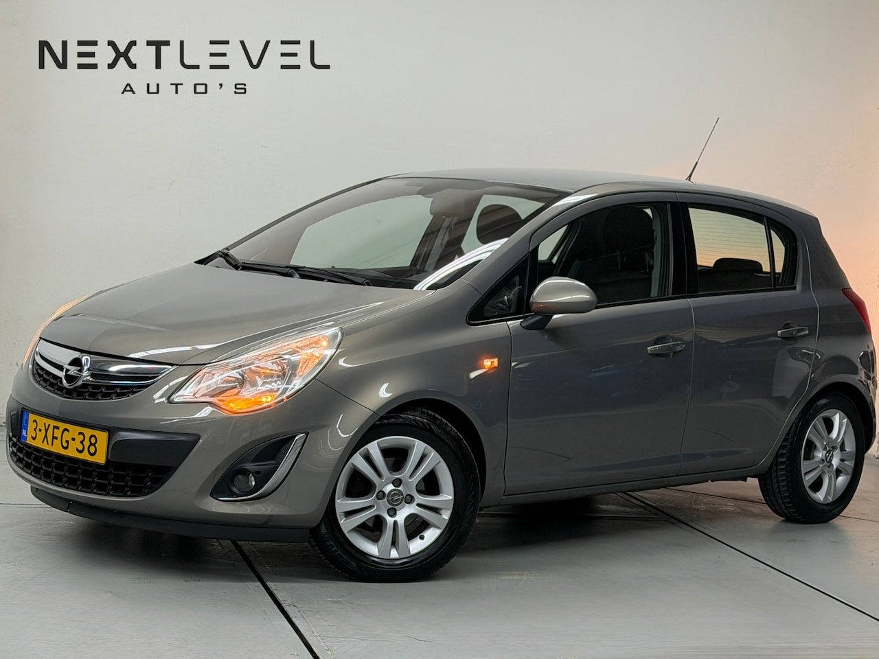 Opel Corsa - 1.2-16V Edition Automaat Cruise Lage KM - AutoWereld.nl
