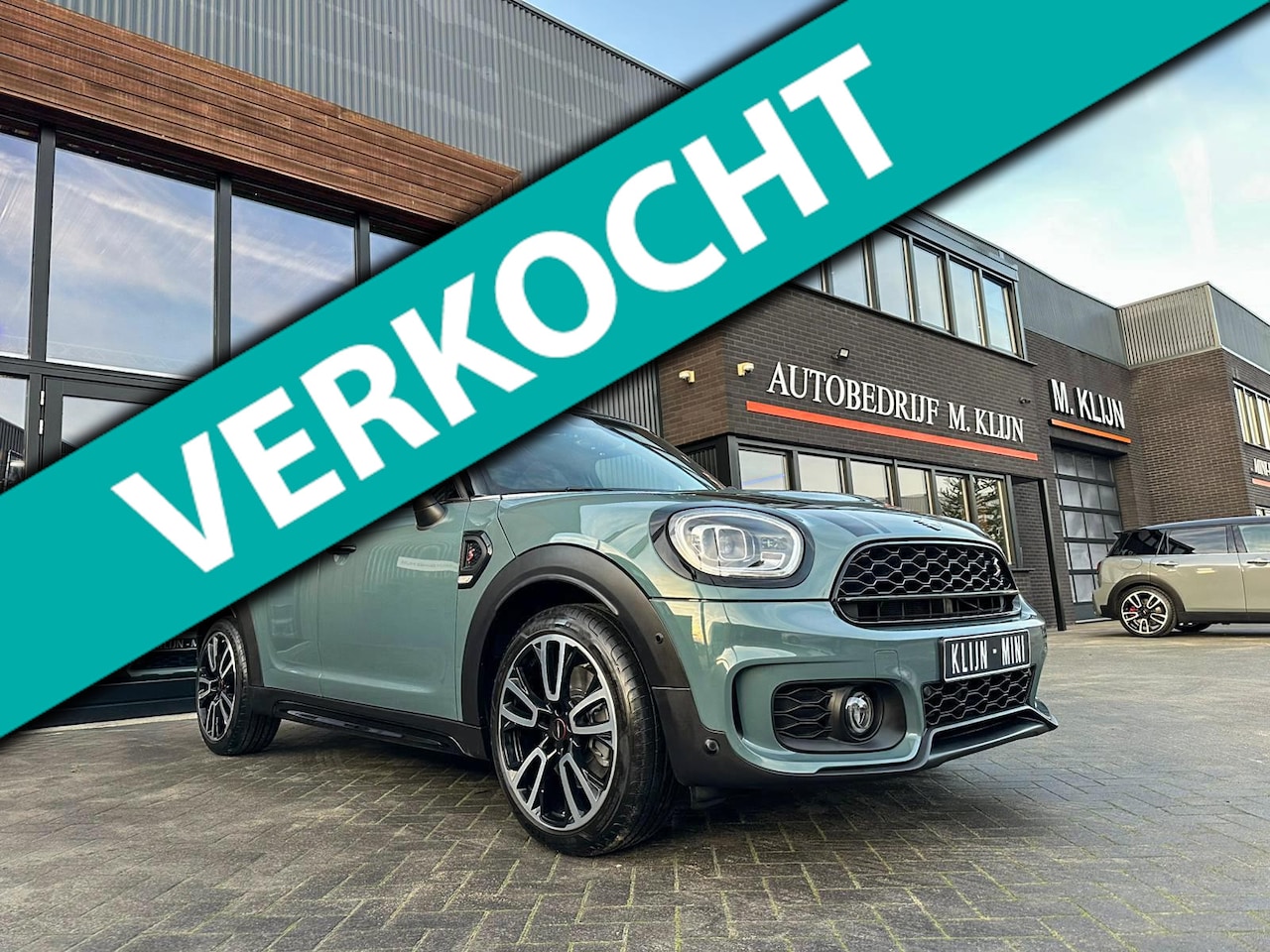 MINI Countryman - Mini 2.0 Cooper S John Cooper Works F1 aut Sage Green/Pano/19"Jcw/Hk/Camera - AutoWereld.nl