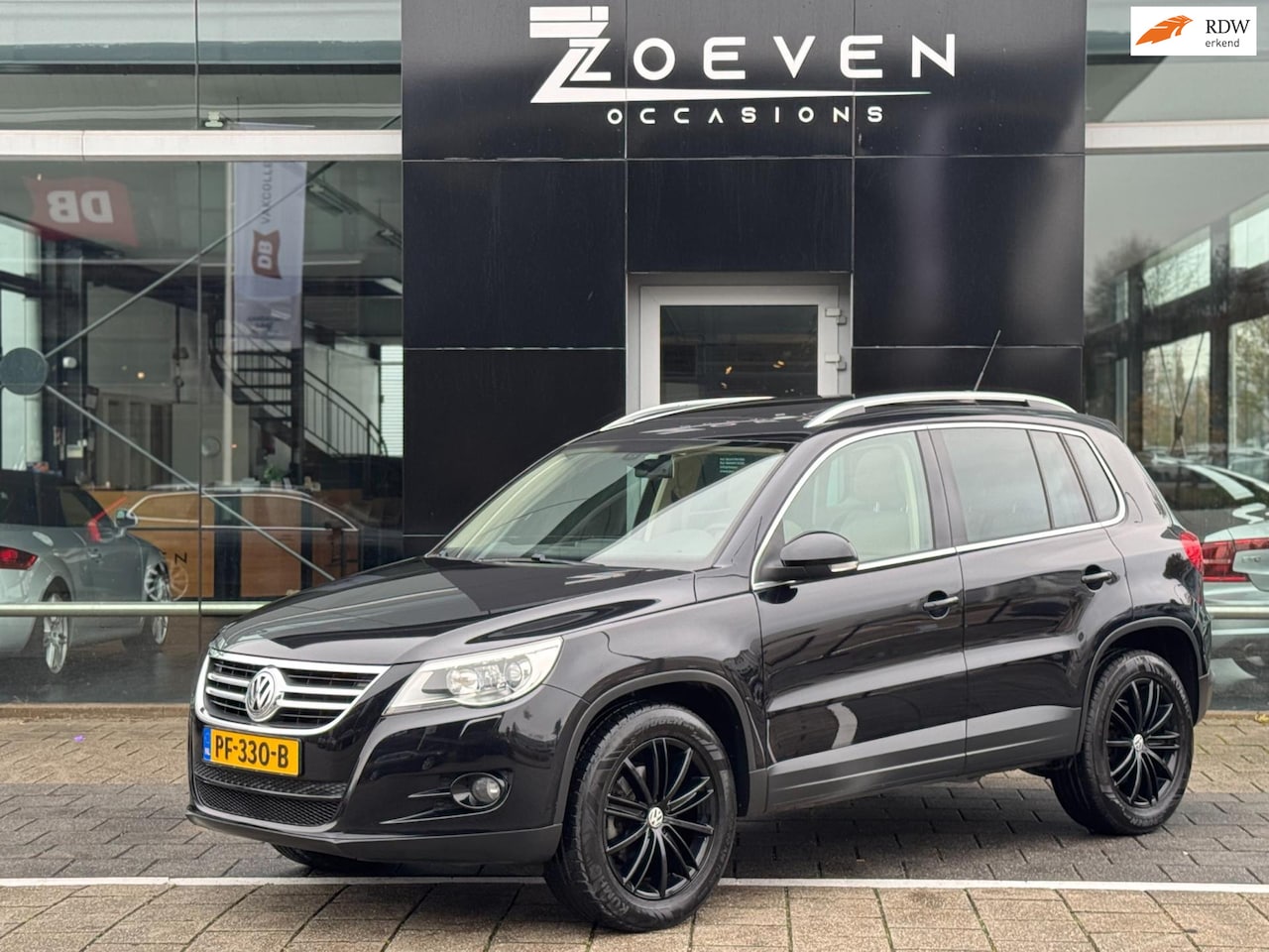 Volkswagen Tiguan - 2.0 TSI Sport&Style 4Motion - AutoWereld.nl