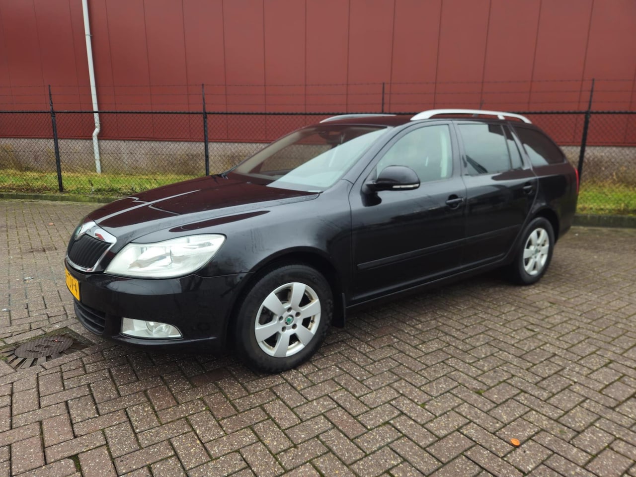 Skoda Octavia Combi - 1.2 TSI Elegance DSG - AutoWereld.nl