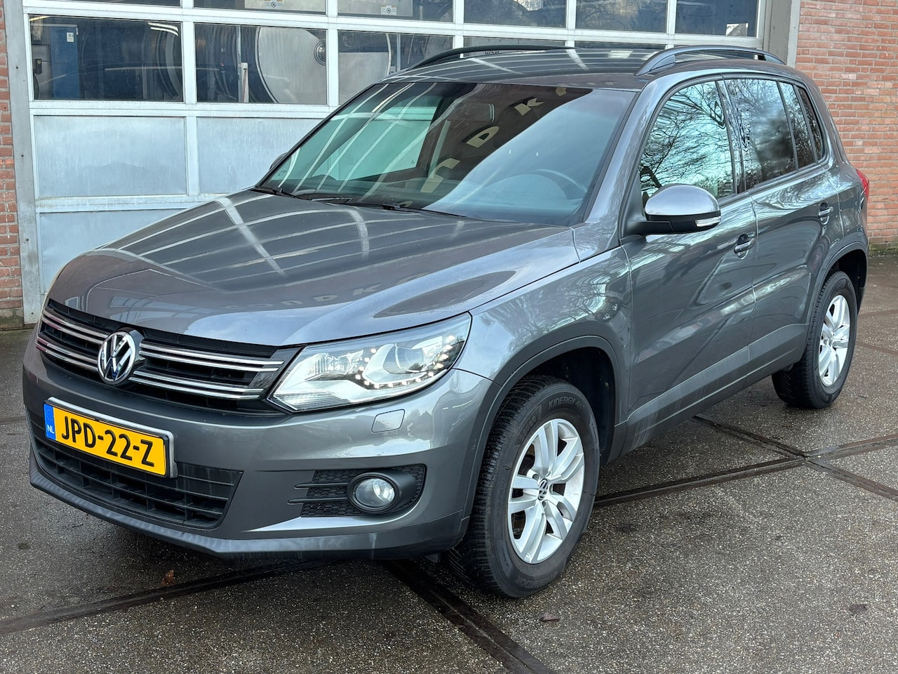 Volkswagen Tiguan - 2.0 TSI Sport&Style 4Motion,AUTOMAAT,XENON,STOEL VERW,LMV,109852 km - AutoWereld.nl