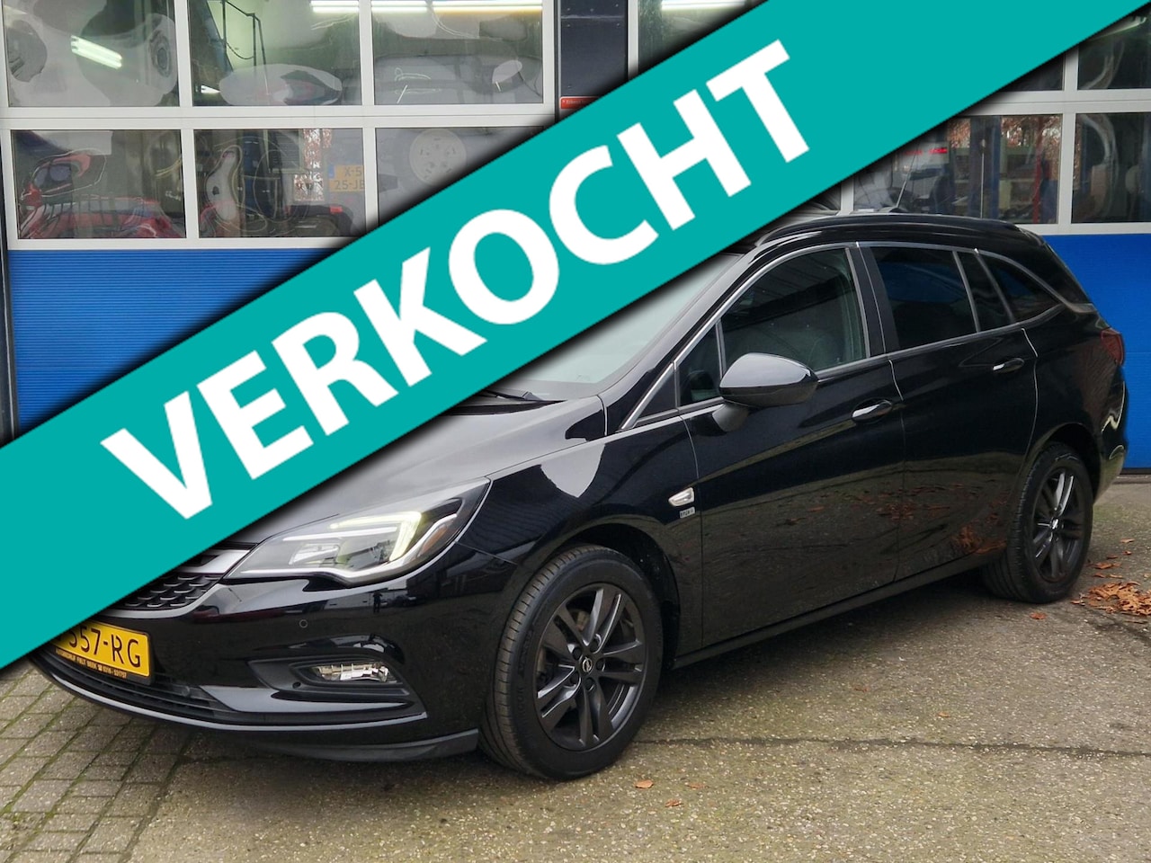 Opel Astra Sports Tourer - 1.0 Turbo 120 Jaar Edition / Apple carplay / Cruise control / Navigatie / Origineel NL - AutoWereld.nl