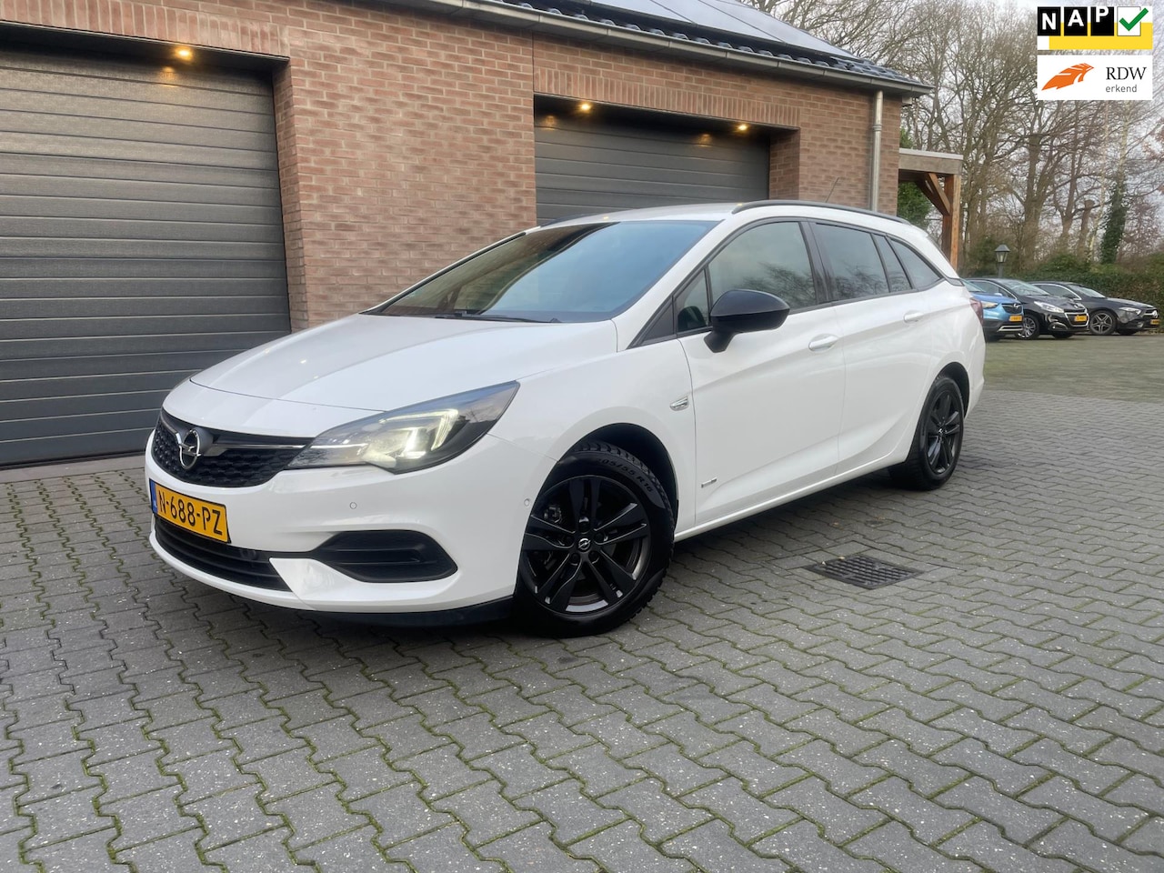 Opel Astra Sports Tourer - 1.2 Design & Tech ECC NAVI CARPLAY 2021 - AutoWereld.nl