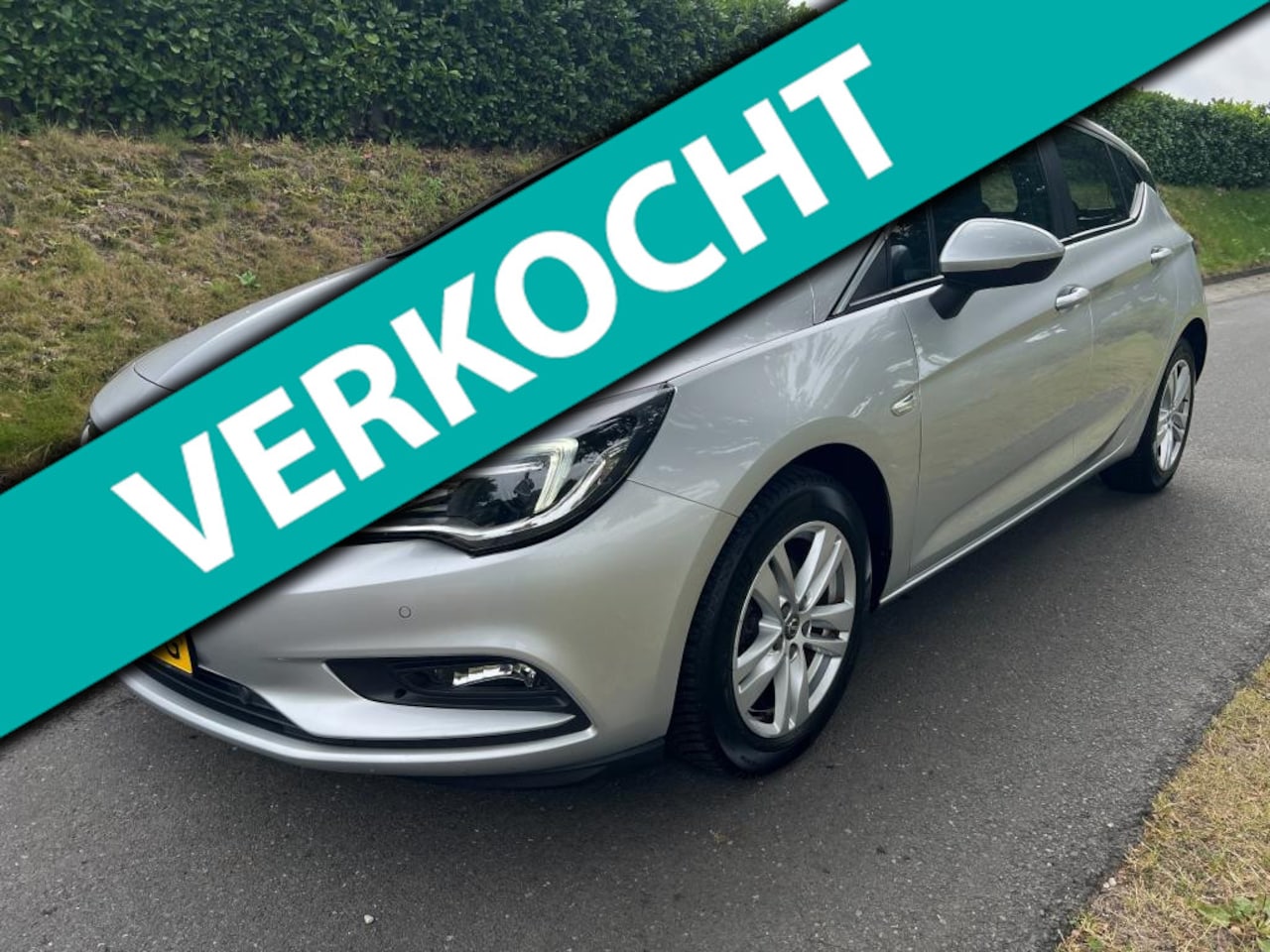 Opel Astra - 1.0 Edition met Nap, Compleet dealeronderhouden en oa: Cruisecontrol, Clima, Pdc v+a, Dab+ - AutoWereld.nl