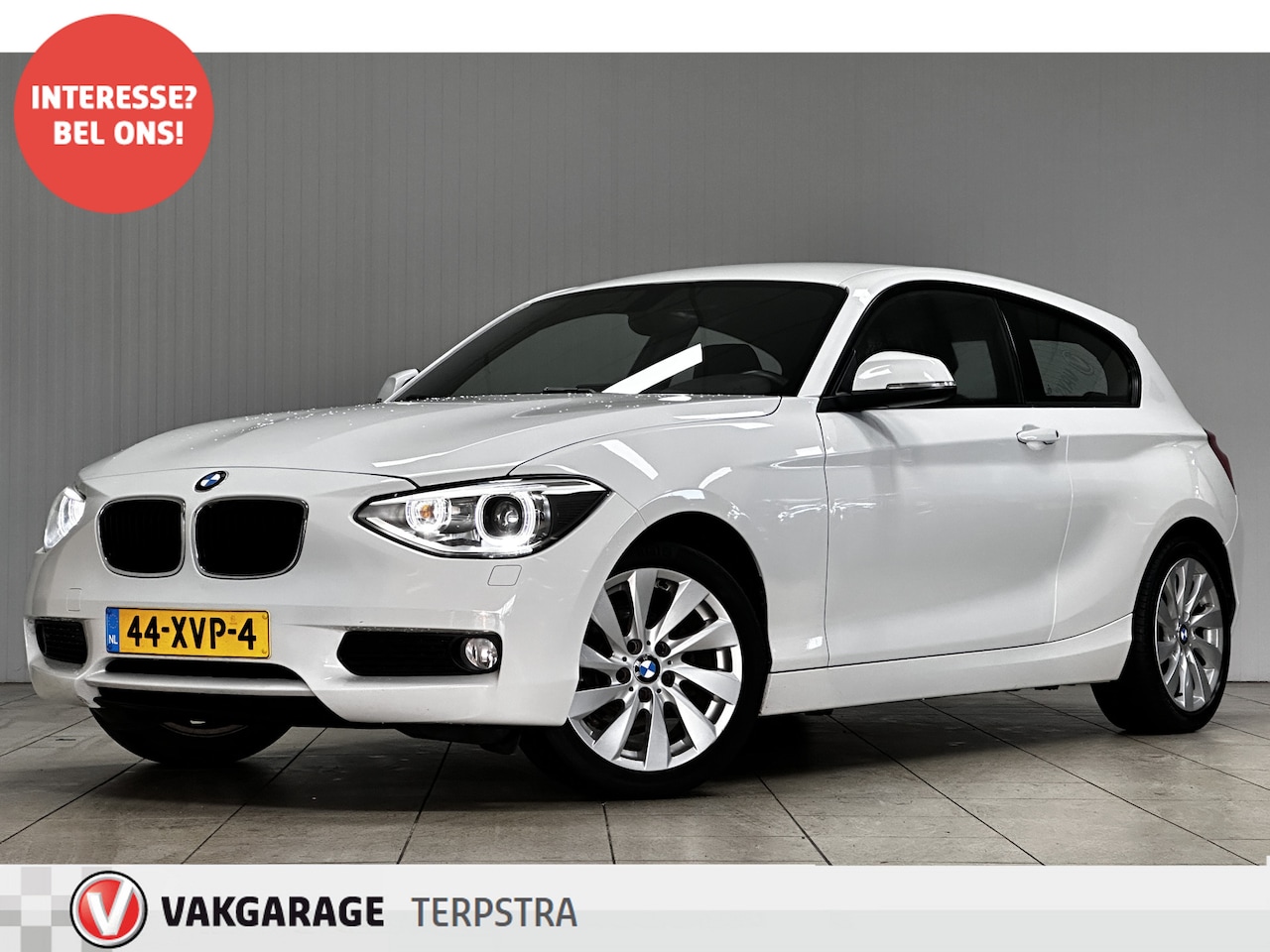 BMW 1-serie - 114i Business+/ 17'' LMV/ M-Sportstuur/ Zwarte-Hemel/ Bi-Xenon/ Navi/ Airco/ Cruise!/ Stoe - AutoWereld.nl