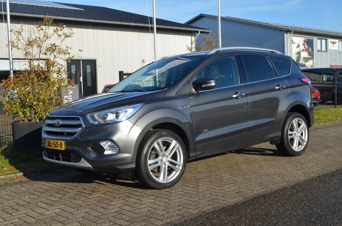 Ford Kuga - 1.5 EcoBoost Titanium 1.5 EcoBoost Titanium, Trek 1850kg, Camera - AutoWereld.nl