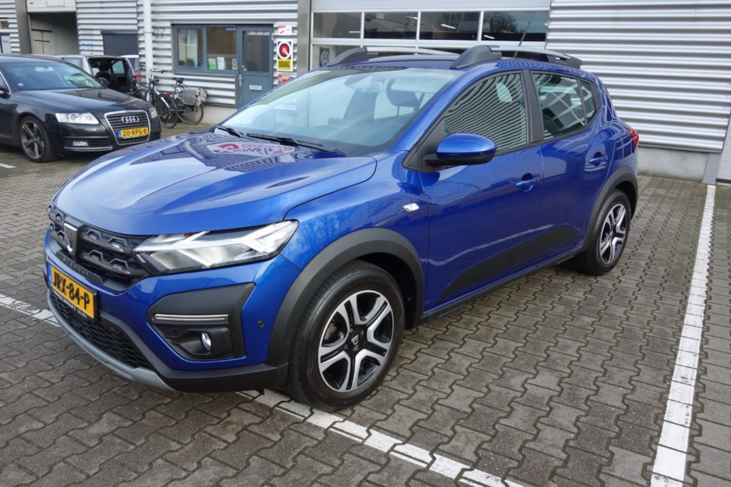 Dacia Sandero Stepway - 1.0 TCE BI-F EXPRES. LPG, Navi, Camera, Trekhaak - AutoWereld.nl
