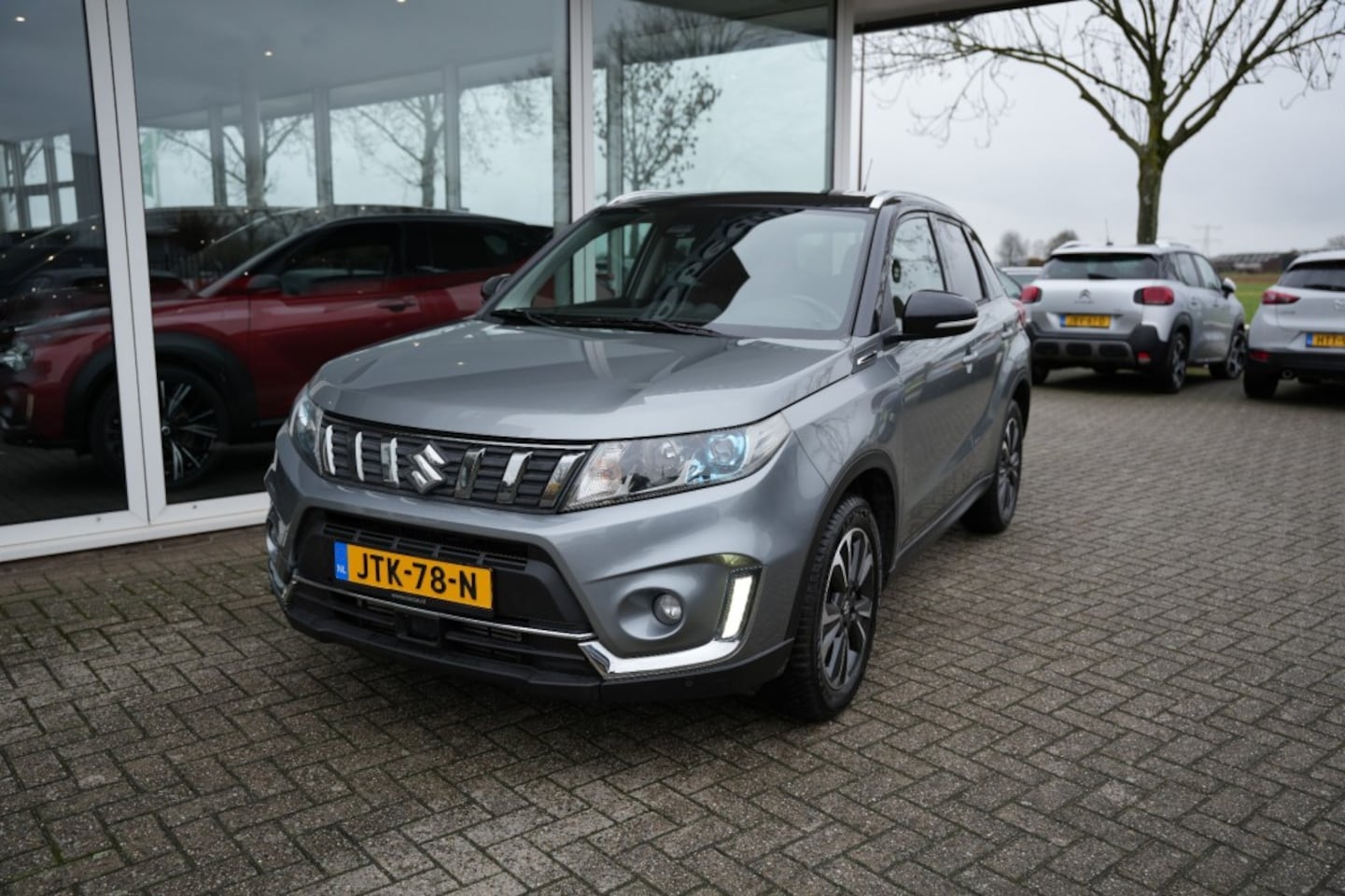 Suzuki Vitara - 1.4 B.JET STIJL/ ALL IN PRIJS/ Camera/ Navigatie/Stoelverwarming - AutoWereld.nl