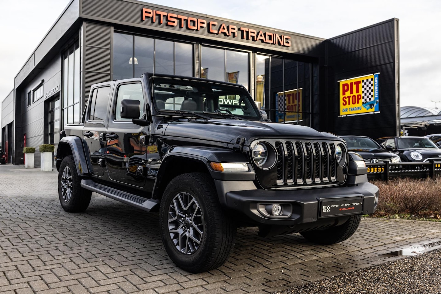 Jeep Wrangler Unlimited - 4xe 380 80th years, 380 PK, 1e eigenaar, ACC, Full optie! - AutoWereld.nl