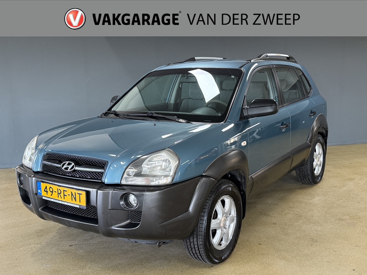 Hyundai Tucson - 2.0i Active | Airco - AutoWereld.nl