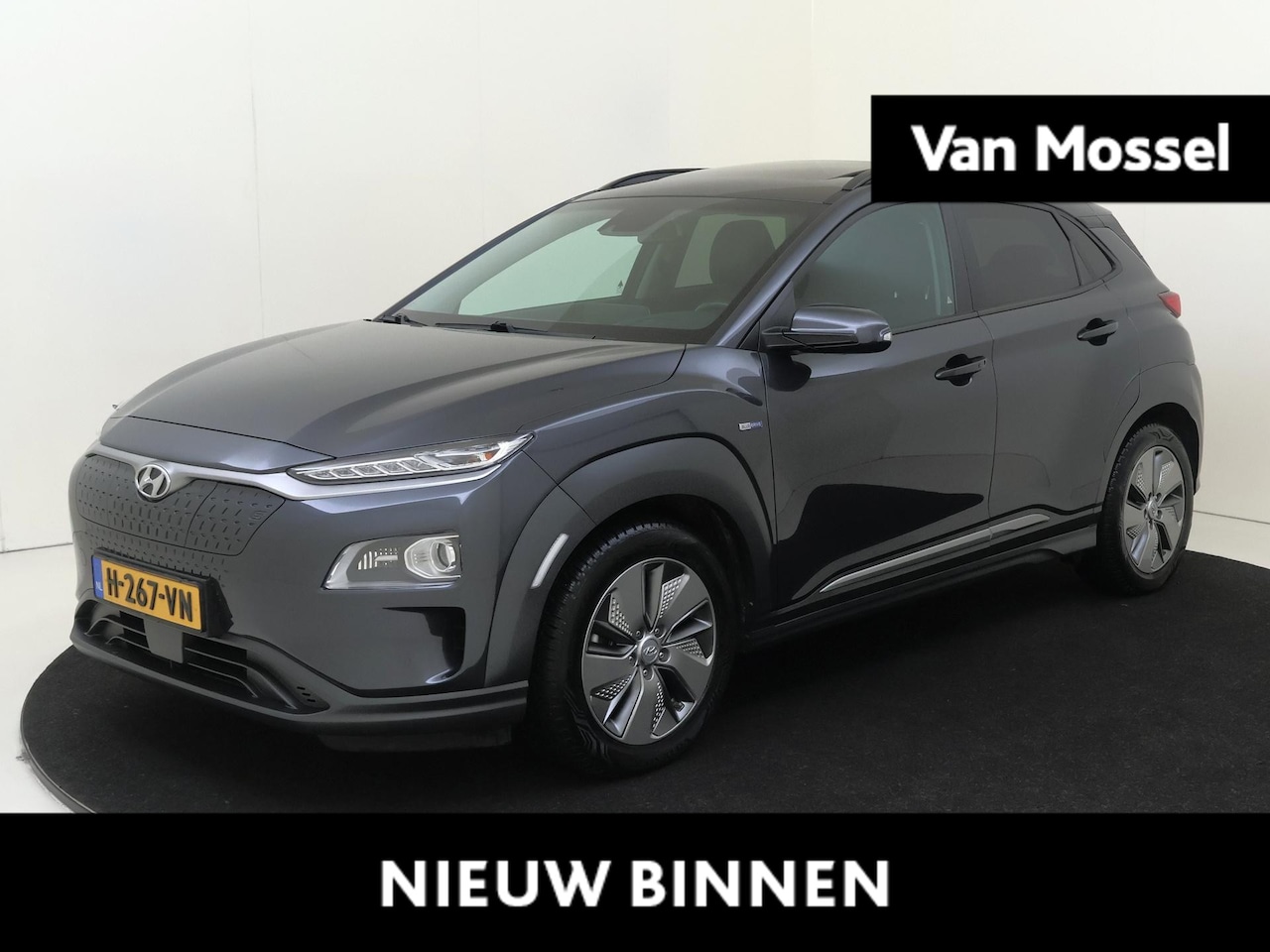 Hyundai Kona Electric - EV Premium 64 kWh | Navigatie | Elektrisch schuifdak | Stoelverwarming | Climate control | - AutoWereld.nl