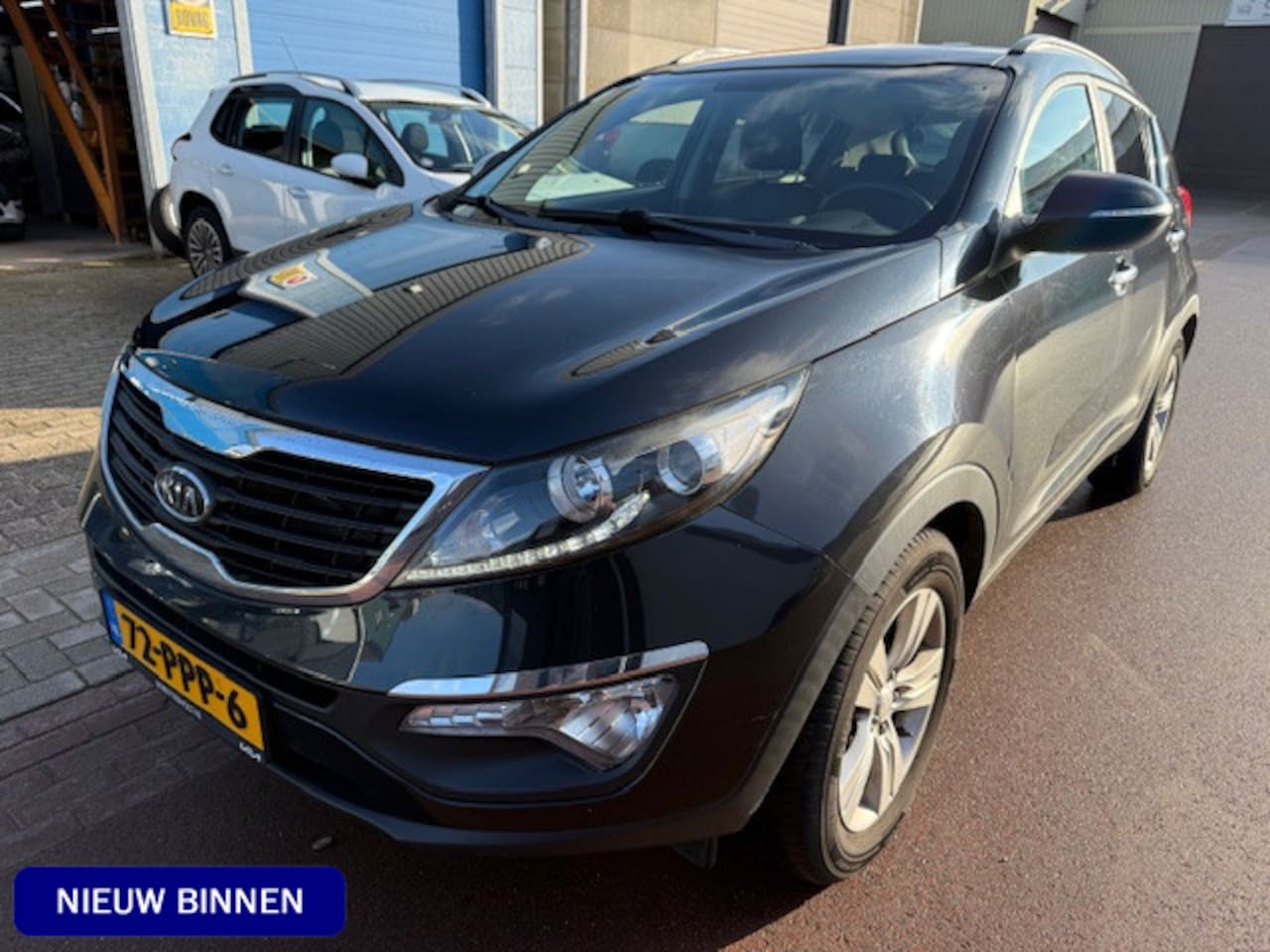 Kia Sportage - 2.0 X-ecutive Plus Pack Automaat 2011 NAP 2WD Trekhaak, Sportvelgen, Bluetooth telefoon, H - AutoWereld.nl