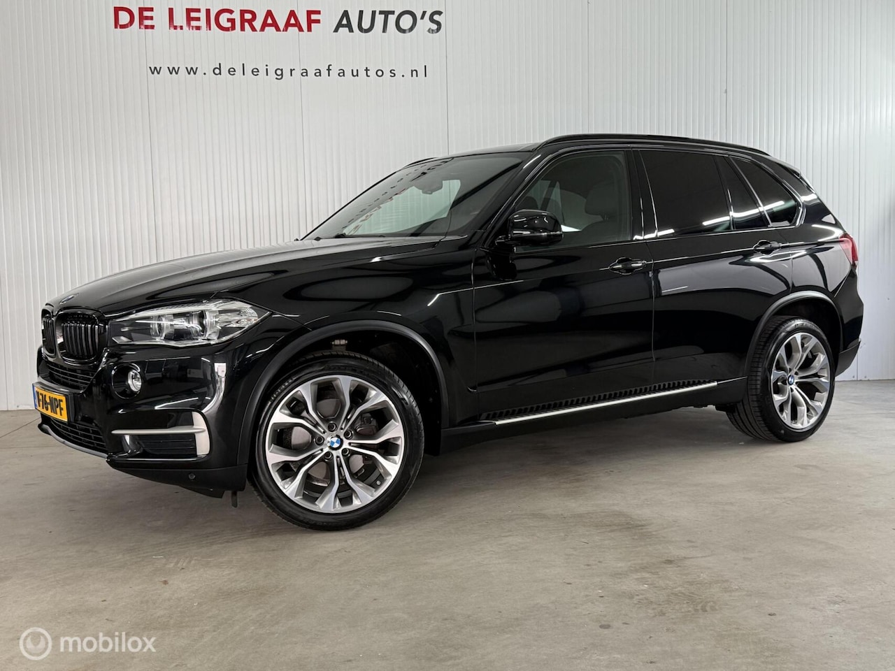 BMW X5 - xDrive30d Aut8 [grijs kenteken] leder,pano,standkachel - AutoWereld.nl