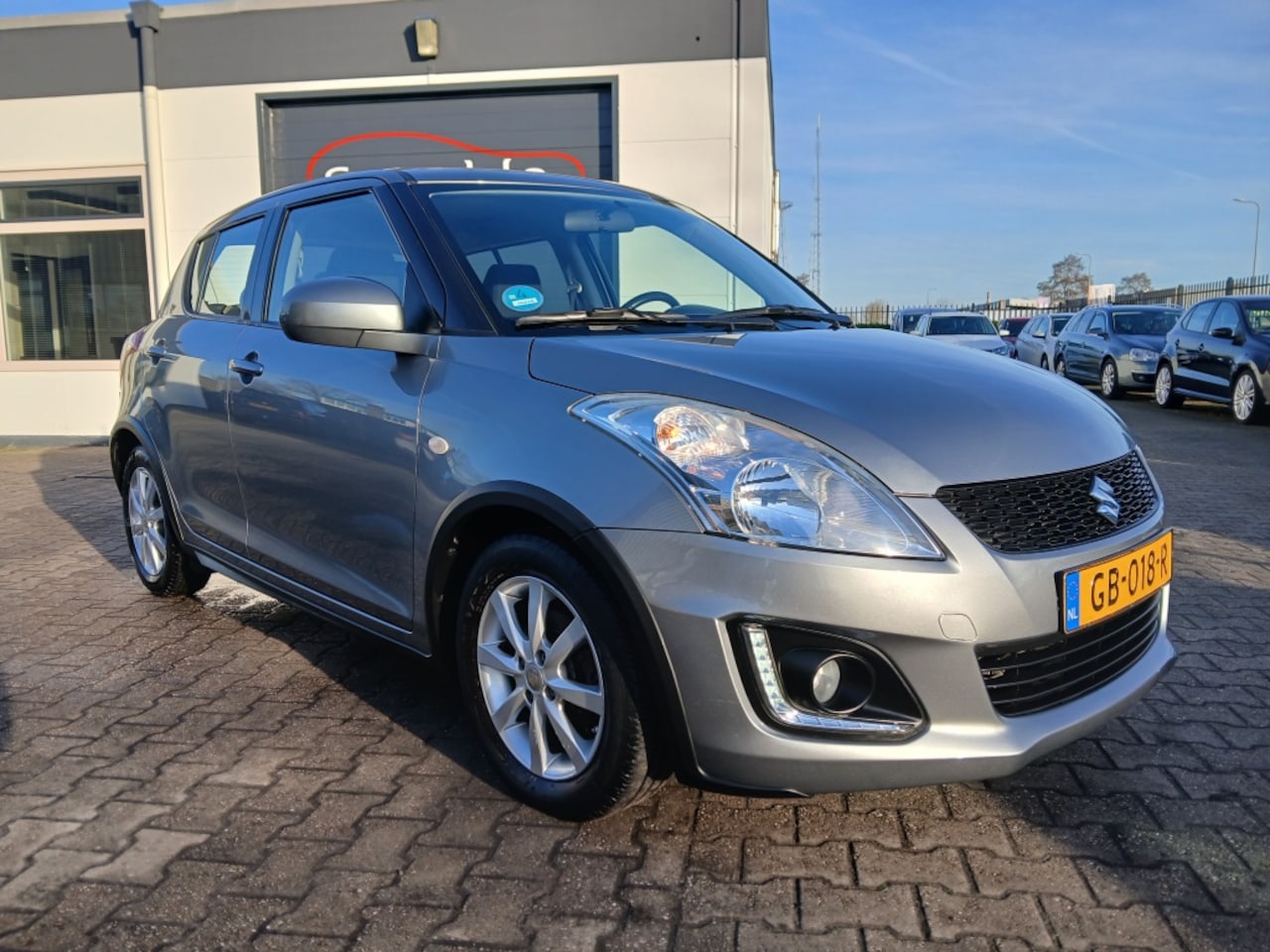 Suzuki Swift - 1.2 NL Auto/1e Eigenaar/151.00Km Nap/Stoelverwarming - AutoWereld.nl