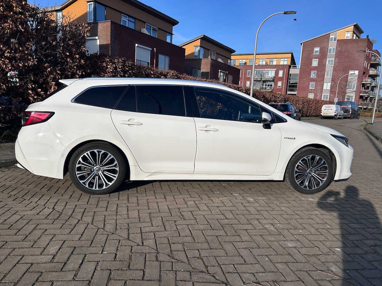 Toyota Corolla Touring Sports - 1.8 Hybrid Executive Met afneembare trekhaak - AutoWereld.nl