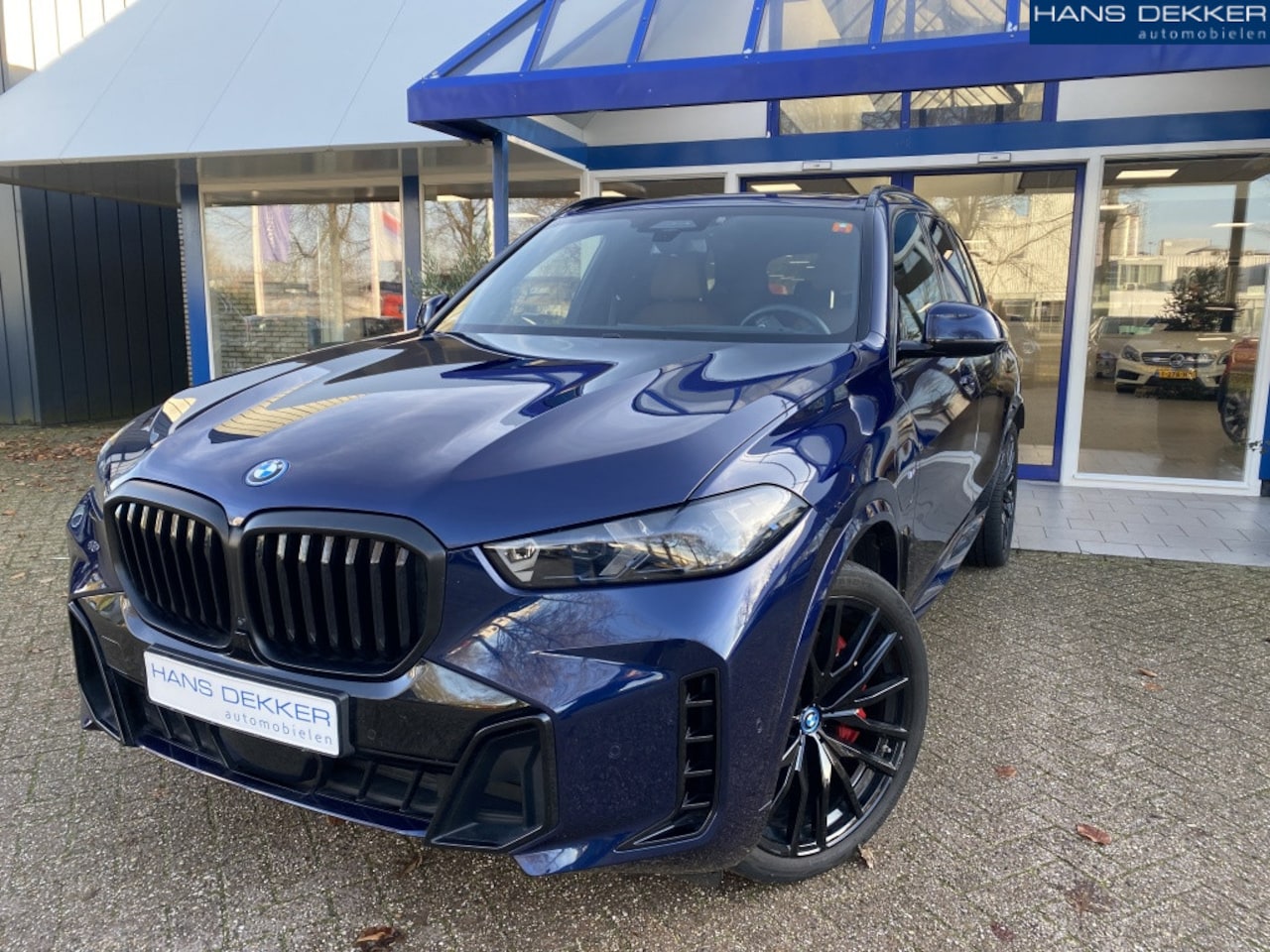 BMW X5 - xDrive50e High Executive I Sky Lounge I M-Sport Pro - AutoWereld.nl
