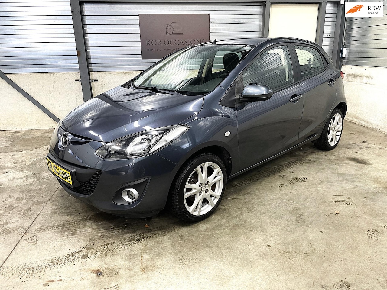 Mazda 2 - 1.3 GT-L 2e eigenaar airco stoelverwarming APK - AutoWereld.nl